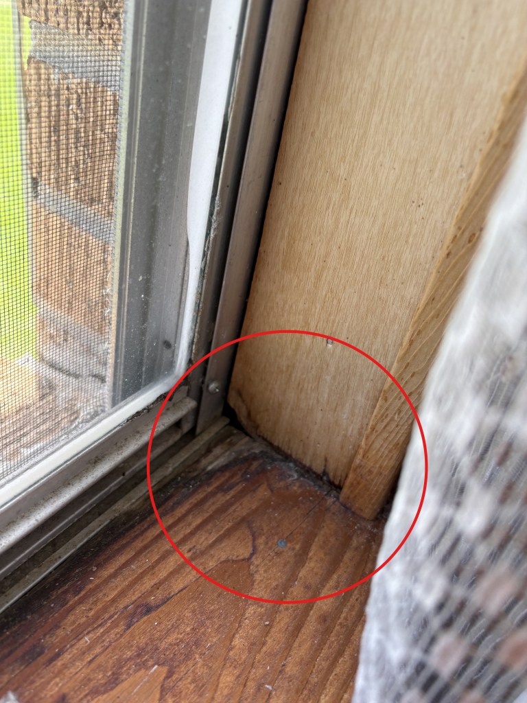 Wood rot at a window frame found during a home inspection